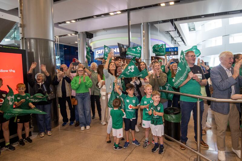 Family and friends of the Ireland Under-20s rugby team at Dublin Airport. Photograph: Tom Honan