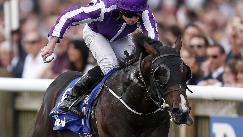 Ryan Moore riding US Navy Flag to victory in the Darley Dewhurst Stakes at Newmarket . Photograph:  Alan Crowhurst/Getty Images