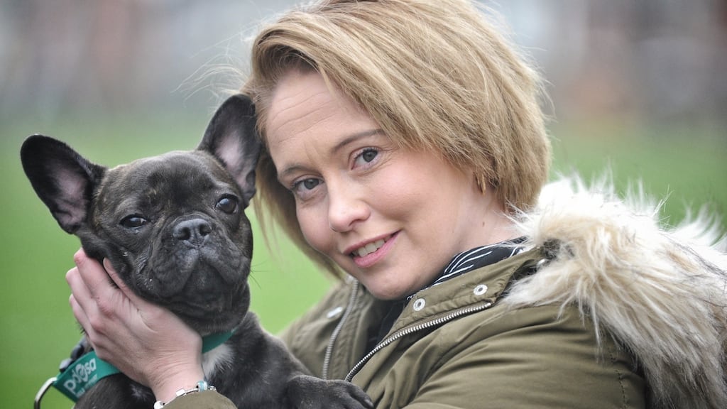 Suzanna Dixon with her French bulldog puppy, Narla, who nearly died from eating a box of chocolates. Photograph: PDSA/PA