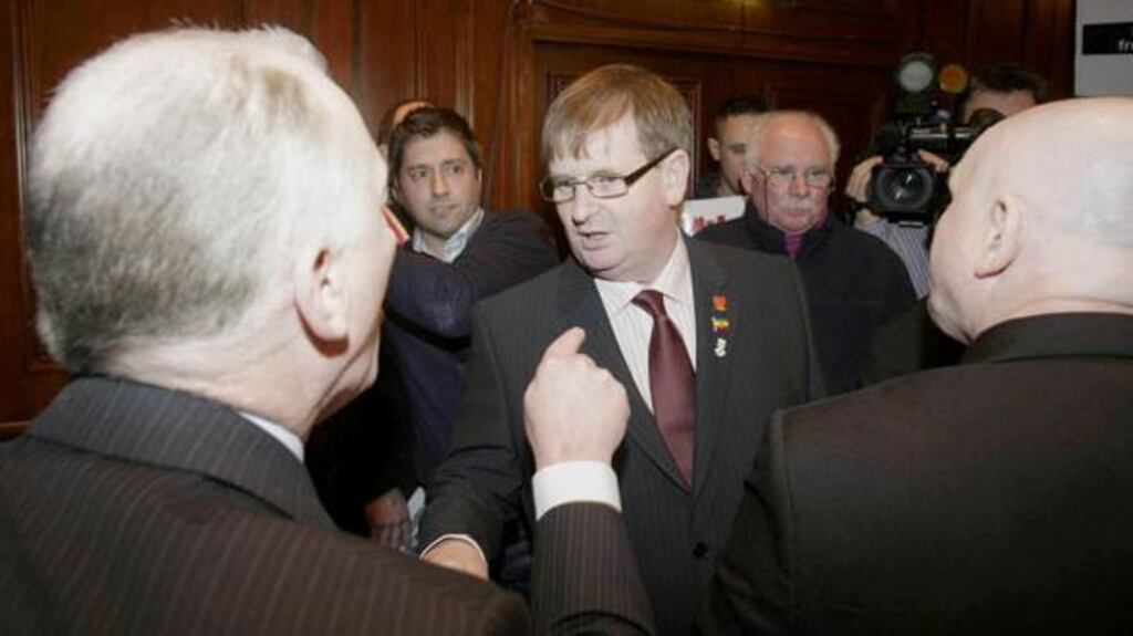 Willie Frazer (centre), a high profile organiser of the loyalist Union flag demonstrations whose car has been torched in an overnight arson attack. Photograph: PA