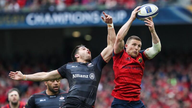 Andrew Conway challenges Saracens’ Sean Maitland during Munster’s Champions Cup semi-final defeat to the English side. Photograph: Billy Stickland/Inpho
