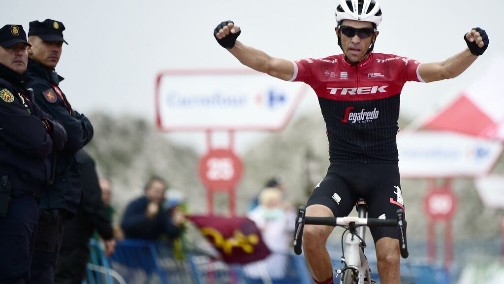 Spanish cyclist Alberto Contador celebrates as he crosses the finish line winning the 20th stage of the Vuelta in his final race before retirement. Chris Froome virtually secured overall victory in the Vuelta a Espana today by extending his lead over Vincenzo Nibali. Photograph: Jose Jordan/Getty Images