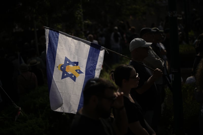 Mourners attend the funeral of hostage Israeli-American Capt Omer Neutra, after his body was returned from Gaza, at Kiryat Shaul cemetery in Tel Aviv on Friday. Photograph: Leo Correa/AP