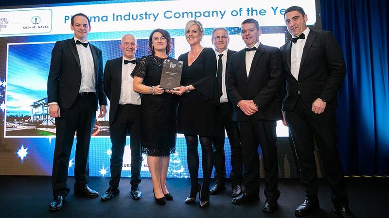 Pamela Quinn, Managing Director, Kuehne + Nagel presents the Pharma Industry Company of the Year award to the AbbVie in Ireland team.