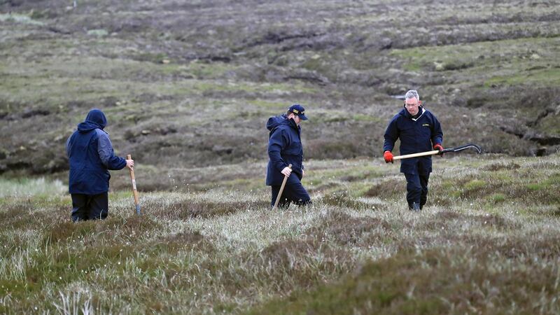 Patricia O’Connor murder case: gardaí search the Wicklow Mountains after the discovery of body parts. Photograph: Colin Keegan/Collins