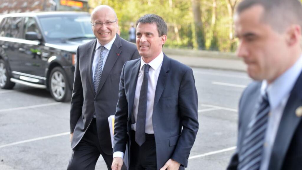 French Ambassador to Ireland Jean Pierre Thebault with French Prime Minister Manuel Valls outside the new French embassy on Merrion Square in Dublin yesterday. Photograph: Alan Betson/The Irish Times.