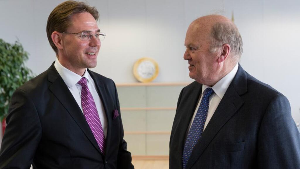 Minister for Finance Michael Noonan meeting economic and monetary affairs commissioner Jyrki Katainen in Brussels yesterday.