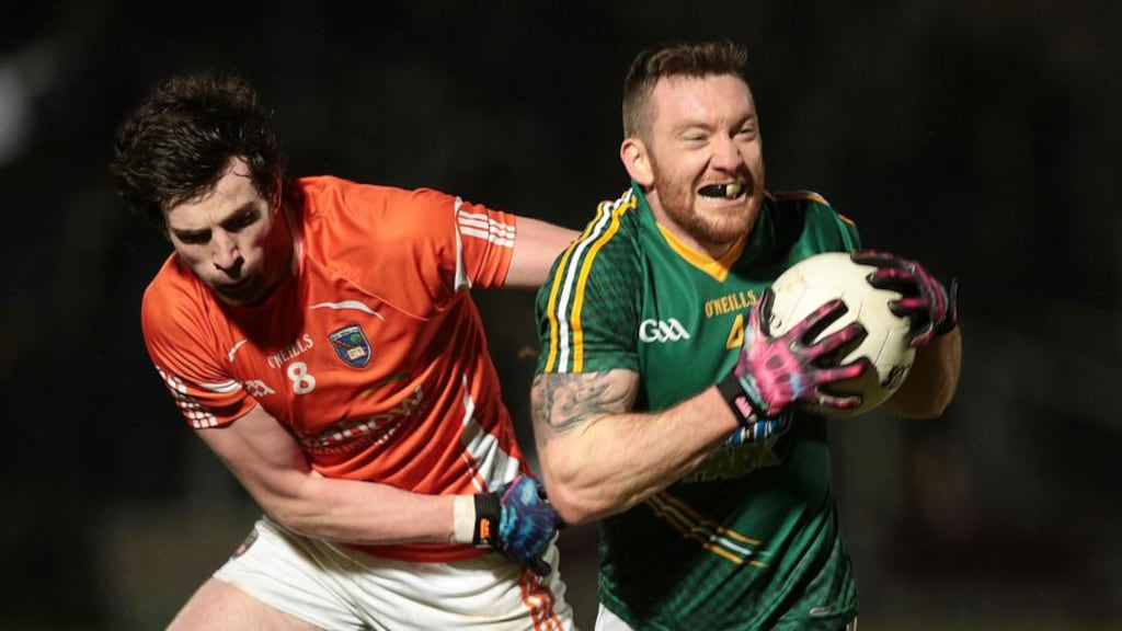 Meath’s Michael Burke with Aaron Findon of Armagh