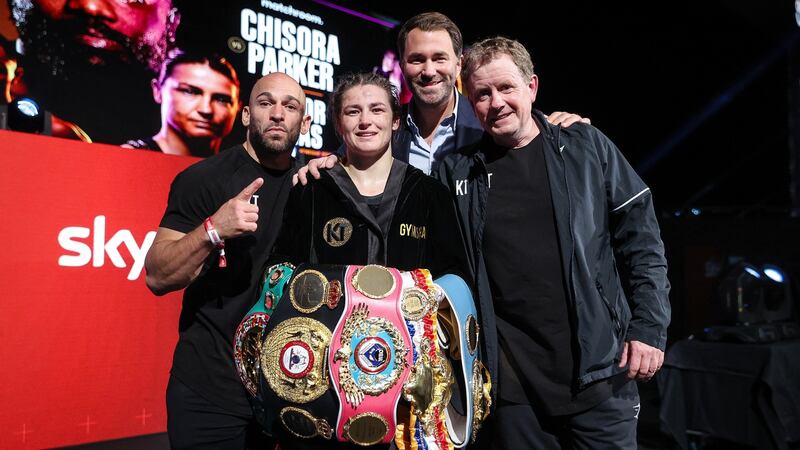 Katie Taylor celebrates with Eddie Hearn and her team. Photo: Dave Thompson/Matchroom Boxing/Inpho