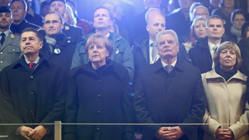 German President Joachim Gauck (second right), his partner Daniela Schadt (right), German Chancellor Angela Merkel (second from the left), and her husband Joachim Sauer (left) during the citizens’ festival at Brandenburg Gate in Berlin tonight.  Photograph: Kay Nietfeld/EPA