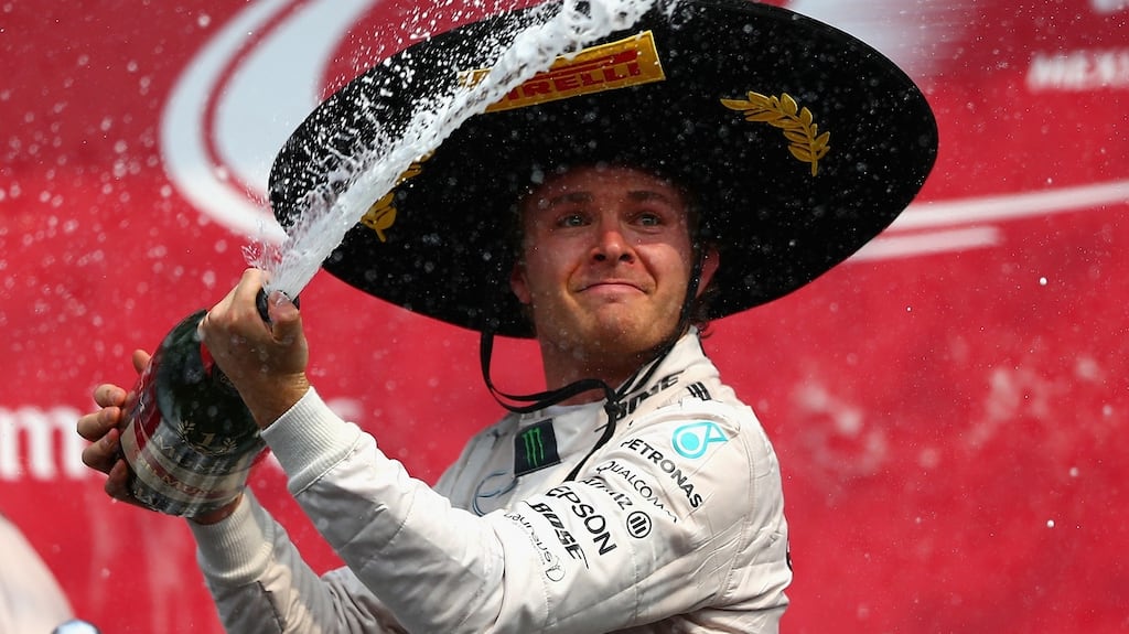 Nico Rosberg of Mercedes GP celebrates on the podium after winning the Formula One Grand Prix of Mexico at Autodromo Hermanos Rodriguez in Mexico City, Mexico. Photo: Clive Mason/Getty Images