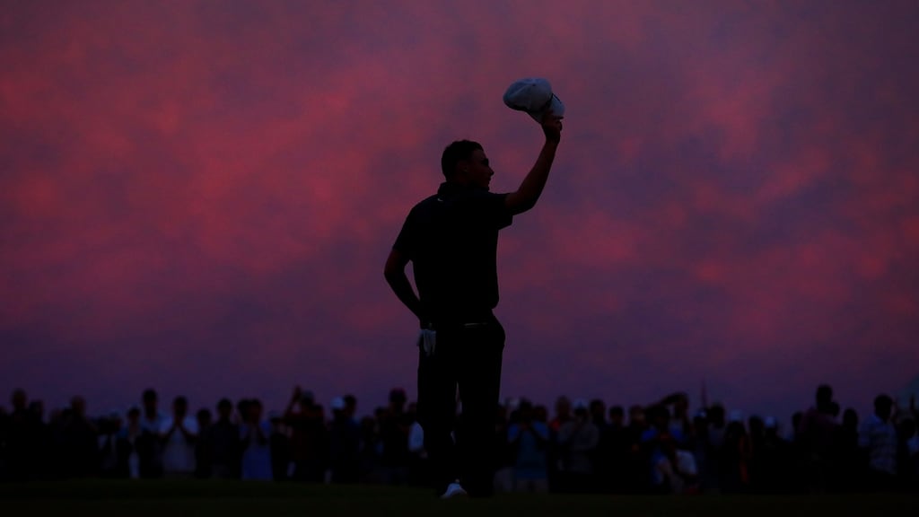 Dusk falls as Aaron Wise celebrates on the 18th green after winning the AT&T Byron Nelson at Trinity Forest Golf Club. Photo: Tom Pennington/Getty Images