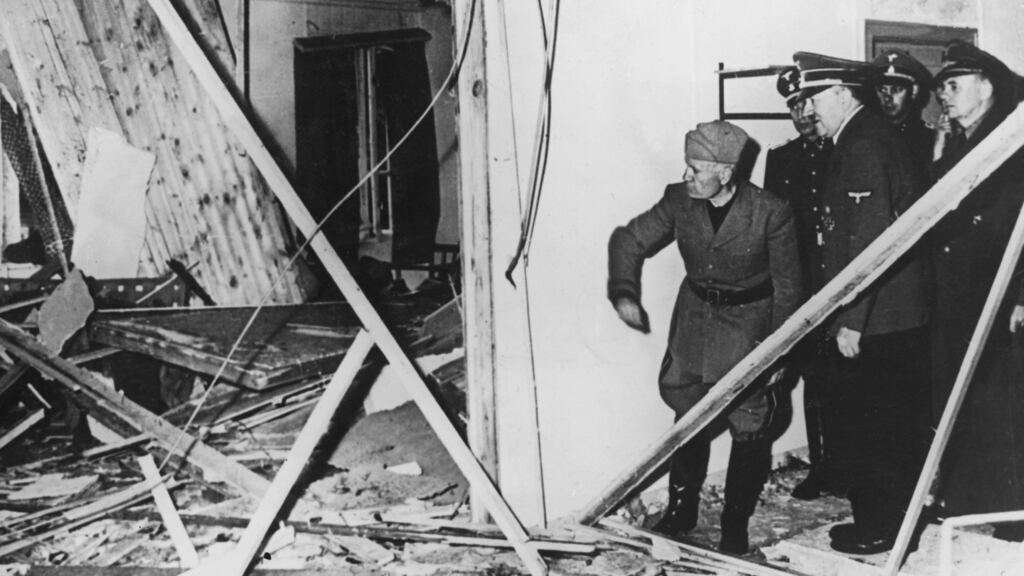 Benito Mussolini and Adolf Hitler  inspect the wreckage of  Hitler’s headquarters following a failed  assassination attempt of the Nazi leader in 1944. Photograph: Keystone/Hulton Archive/Getty Images