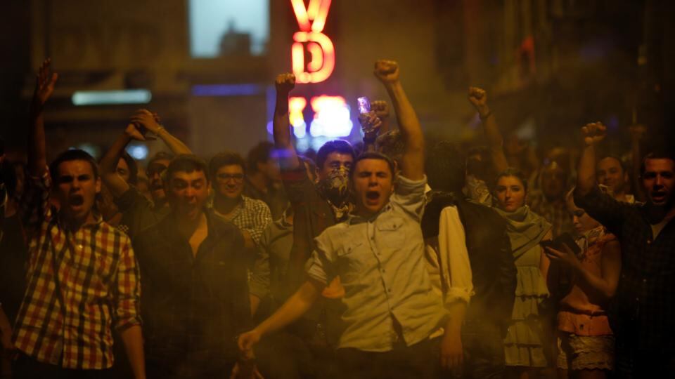 Anti-government protesters shout slogans as they clash with riot police in central Ankara early this morning. Photograph: Umit Bektas/Reuters