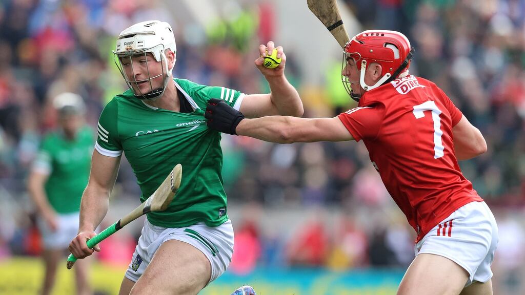 Limerick’s Kyle Hayes and Ciarán Joyce of Cork during Sunday’s clash. Photograph: Bryan Keane/Inpho