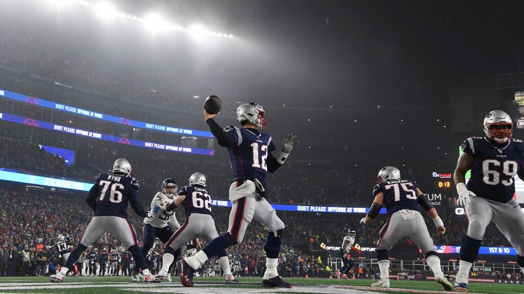 New England Patriots quarter-back Tom Brady throwing an interception to the Tennessee Titans for a touchdown in the final seconds of their AFC wild card playoff game at Gillette Stadium, Massachusetts. Photograph: EPA/John Cetrino