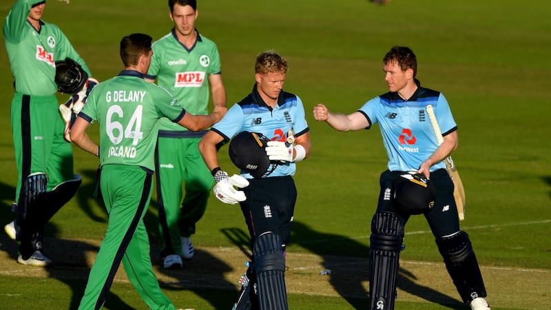 England captain Eoin Morgan (right) fist bumps Ireland’s Gareth Delany after England’s win. Photo: Mike Hewitt/NMC Pool/PA Wire