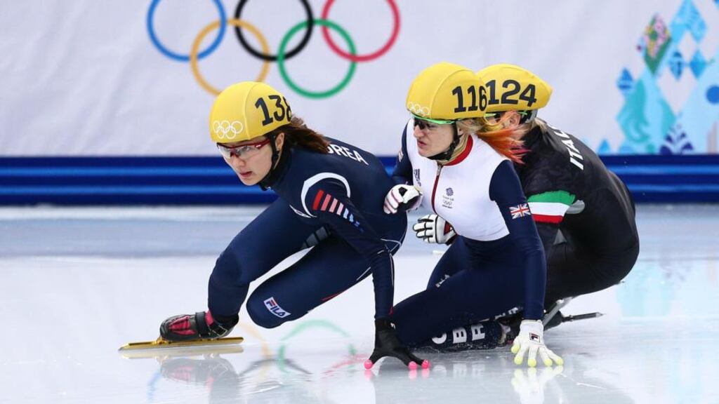 The incident which cost Great Britain’s Elise Christie (centre) the silver medal as she collides with Seung-Hi Park of South Korea (left) and Ital’s Arianna Fontana.