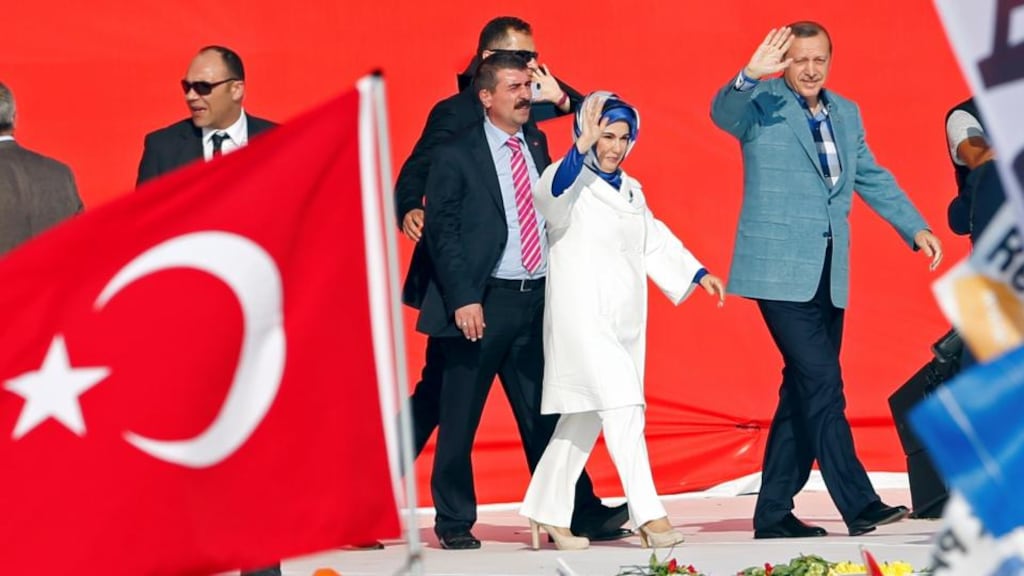 Turkish prime minister Tayyip Erdogan and his wife Emine wave to supporters as they arrive at a rally of ruling AK party in Istanbul yesterday. Photograph: Reuters/Murad Sezer