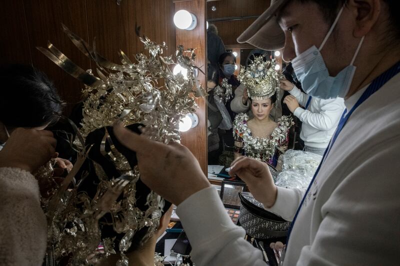 A singer in traditional garb prepares for a fashion performance in Wuhan on January 1st. Photograph: Gilles Sabrie/The New York Times