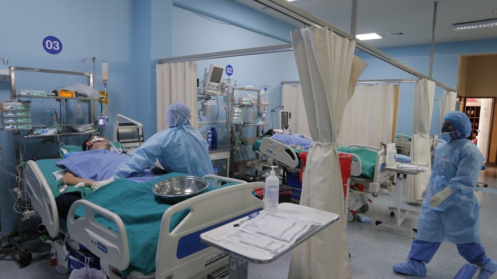 Health workers treat new Covid-19 patients within the Intensive Care Unit of the Alberto Sabogal Hospital, in Callao, Peru on January 15th. Photograph: Luis Angel Gonzalez/EPA