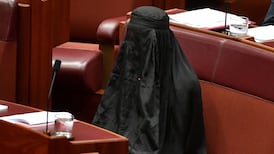 Australian senator rebuked for wearing burka to parliament