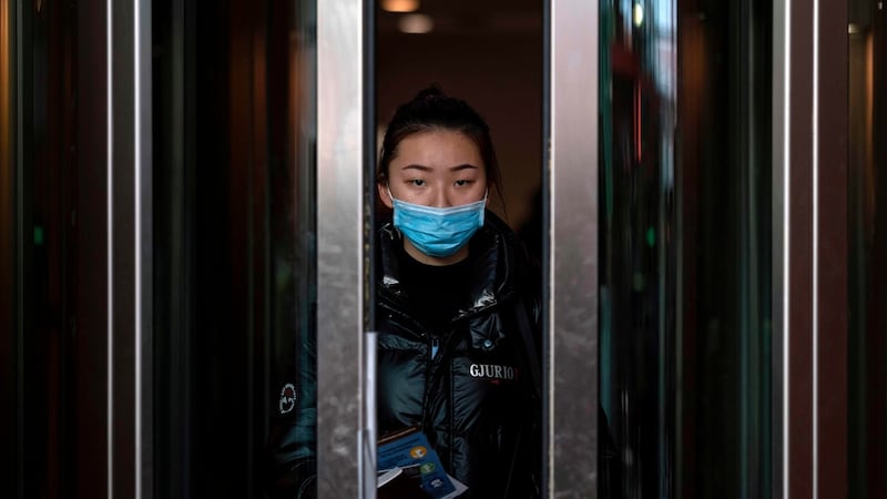 A passenger from a Chinese Hainan Airlines flight from Beijing walks out of the arrivals gate at the Abelardo L Rodriguez International airport in Tijuana, Mexico, on January 27th. Photograph: Guillermo Arias/AFP via Getty