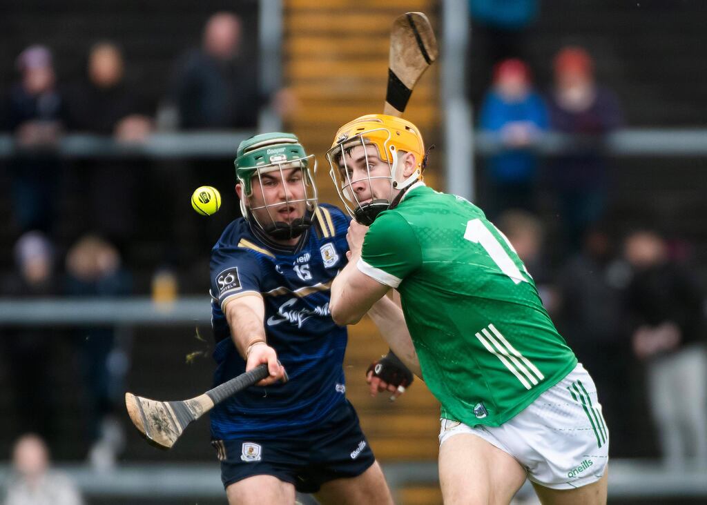 Galway’s Evan Niland and Limerick’s Adam English. Photograph: Evan Logan/Inpho