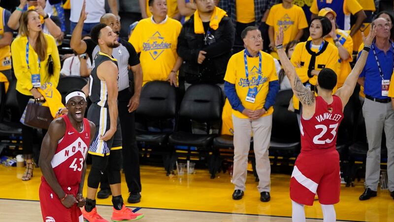 Raptors players celebrate at the end. Photo: John G Mabanglo/EPA
