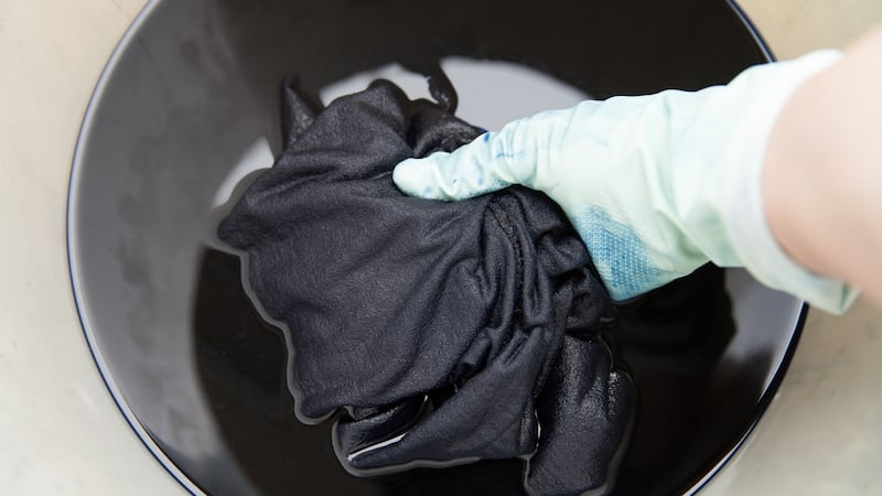 Faded black garments can be over-dyed at home using a Rit Dye but there are a few things to keep in mind. Photograph: iStock