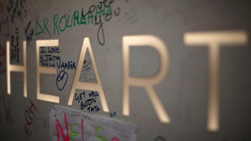 Well-wishers left messages to the former South African president on the sign outside the Medi-Clinic Heart Hospital. Photograph: Christopher Furlong/Getty Images