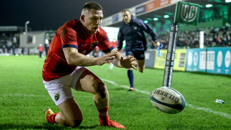 Andrew Conway dives to score Munster’s sole try in Galway. Photograph: Dan Sheridan/Inpho