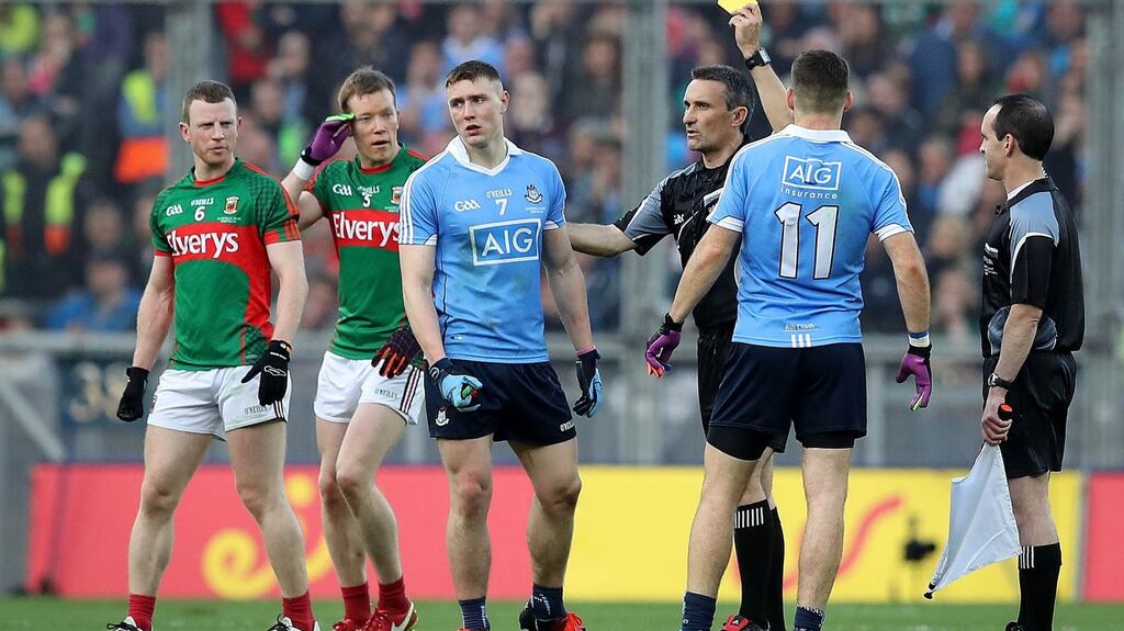 Dublin’s John Small is yellow-carded by referee Maurice Deegan in the All-Ireland final. When Deegan was chosen to referee the the match he was basically thrown into a bear-pit and told “good luck now”. Photograph: INPHO/Ryan Byrne