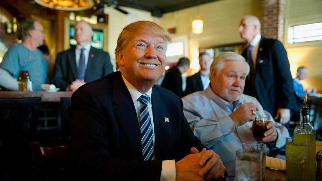 Republican presidential candidate Donald Trump with North Charleston mayor Keith Summey in South Carolina. Photograph: Matt Rourke/AP Photo