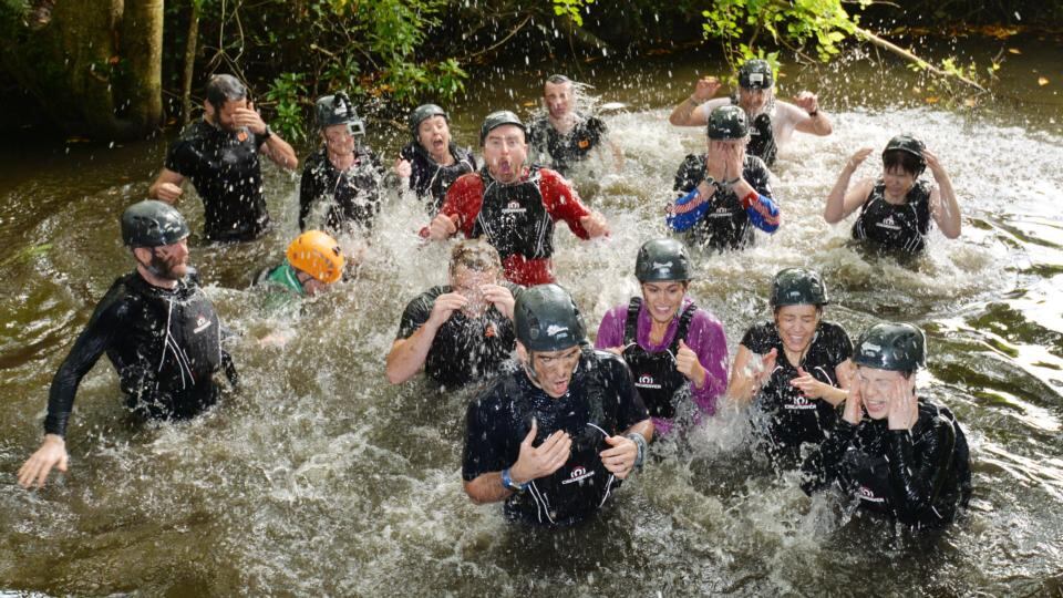 Conor Pope does a river dance with other participants in the Bear Grylls  Survival Academy at Carton House, Maynooth. Photograph: Alan Betson