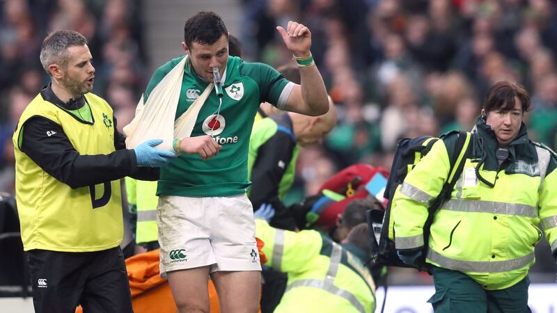 Ireland’s Robbie Henshaw leaves Aviva pitch. Photograph: Brian Lawless/PA