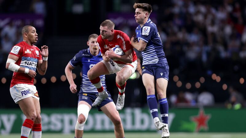 Racing 92’s Finn Russell and Rohan Janse van Rensburg of the Sale Sharks in action at their Champions Cup quarter-final match at La Défense Arena in Paris on May 8th. Photograph: Laszlo Geczo/Inpho