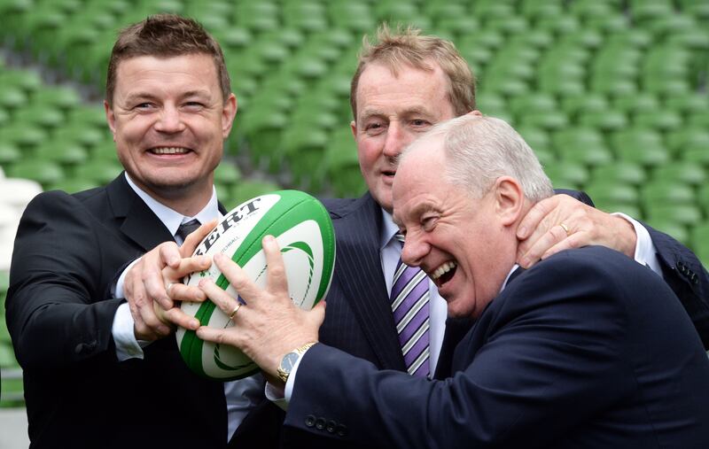 Michael Ring, then minister of State for tourism and sport, with  
Brian O'Driscoll and taoiseach Enda Kenny at the Aviva stadium, Dublin. Photograph: Eric Luke