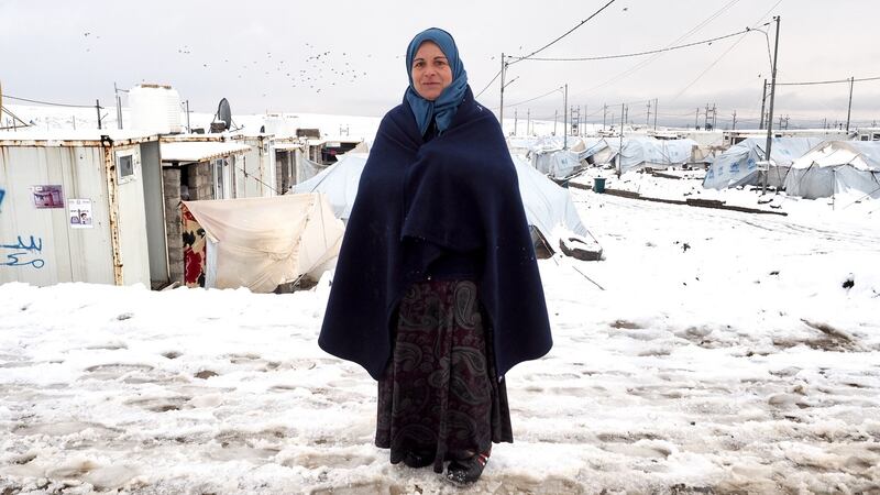 Nasiba (40) on her way home from the school at Bardarash refugee camp, where she works as a cleaner. Photograph: Lorraine Mallinder