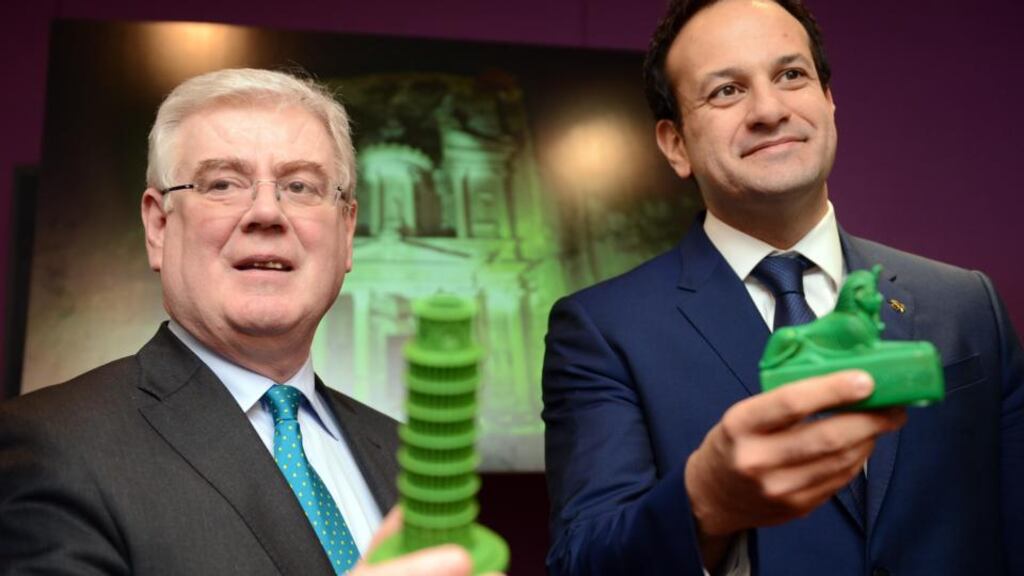 Tánaiste Eamon Gilmore and Minister for Tourism Leo Varadkar at the launch of Tourism Ireland Global Greening 2014 in Dublin.  The initiative sees global  landmarks turn green for St Patrick’s Day. Photograph: Eric Luke