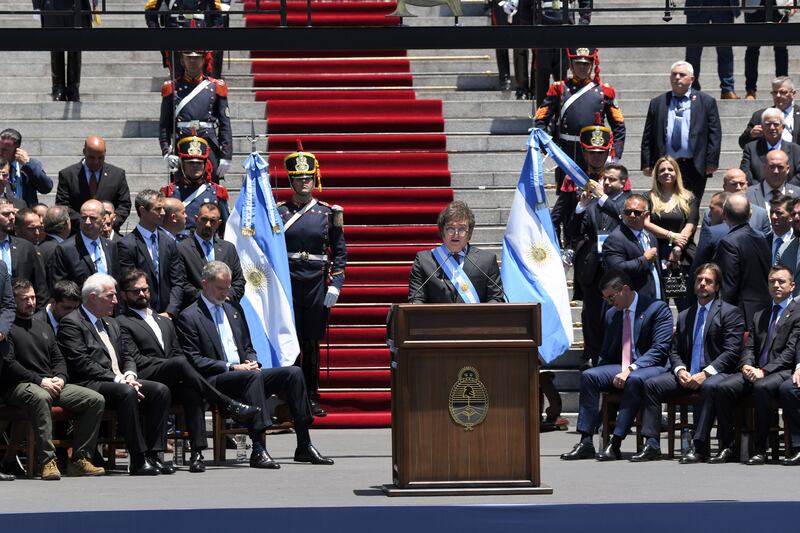 Argentina’s newly sworn-in president Javier Milei speaks outside Congress in Buenos Aires, Argentina. Photograph: Gustavo Garello/AP