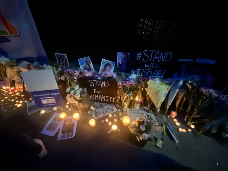 Israelis and wellwishers attend a vigil for the victims of Hamas attacks in Israel outside the embassy in Shelbourne Road. Photograph: Carl O'Brien