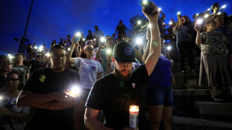 Mourners take part in a vigil at El Paso High School. Photograph: REUTERS/Jorge Salgado