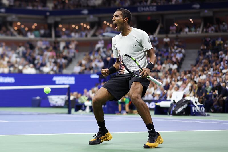 Felix Auger-Aliassime celebrates a point against Jannik Sinner. Photograph: Clive Brunskill/Getty Images