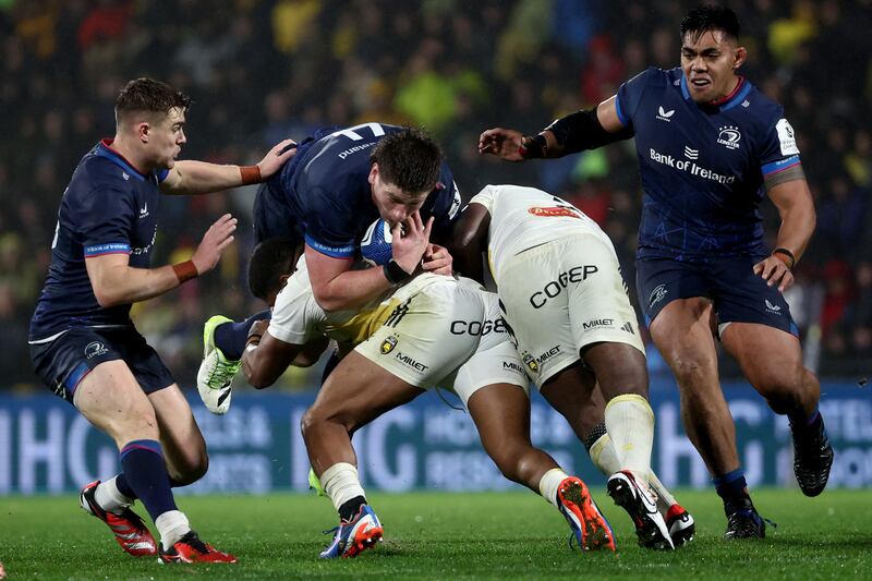 Leinster lock Joe McCarthy is tackled by La Rochelle centre Jonathan Danty during the Champions Cup Pool 4 game at Stade Marcel Deflandre. Photograph: Romain Perrocheau/AFP via Getty Images)