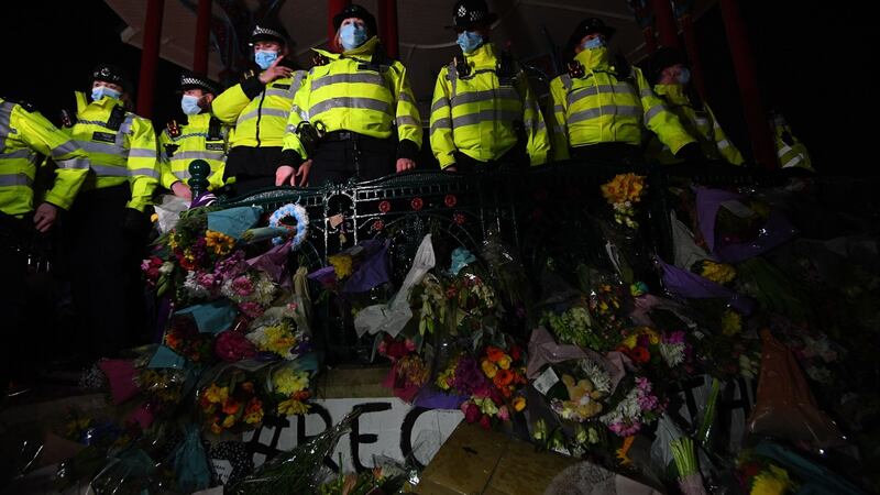 Police surround the band stand in Clapham Common. Photograph: PA