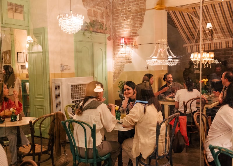 Young Iranians at Cafe Godot in Tehran. Photograph: Nanna Heitmann/New York Times