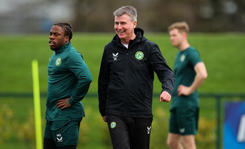 Stephen Kenny at training with Michael Obafemi: 'Why would we change now? Why would we take a step back now? This is the time that the team needs to show conviction.' Photograph: Ryan Byrne/Inpho