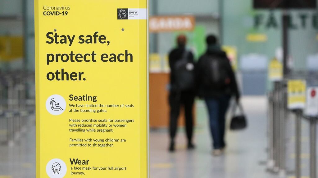 Covid signage in Dublin Airport’s Terminal 2: Under European Commission proposals, unvaccinated people will get an exemption from travel restrictions if they have a negative Covid test. Photograph: Brian Lawless/ PA Wire