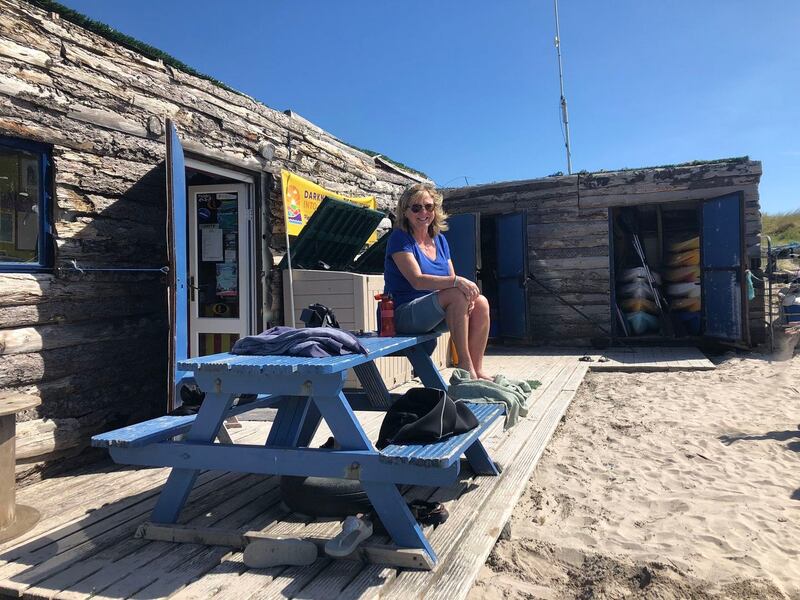 Helen Wilson of Derrynane Sports beside her ‘log cabin’ in the harbour. Photograph: Roisin Ingle
